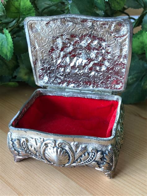 trinket box with trinkets inside